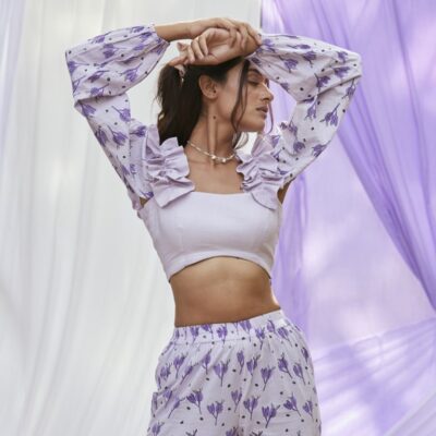 Embrace summer vibes in this whimsical, cotton block printed top with detachable sleeves. Its cool purple hue adds a touch of enchantment to your casual outings