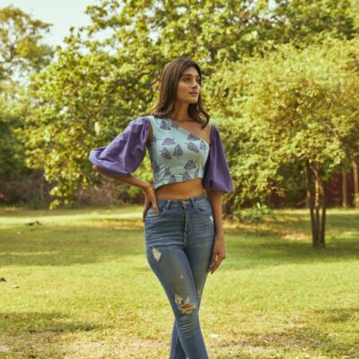 "A fashionable one-shoulder block printed top in blueberry haze color, made from Kala cotton. Features detachable sleeves for versatile styling options."
