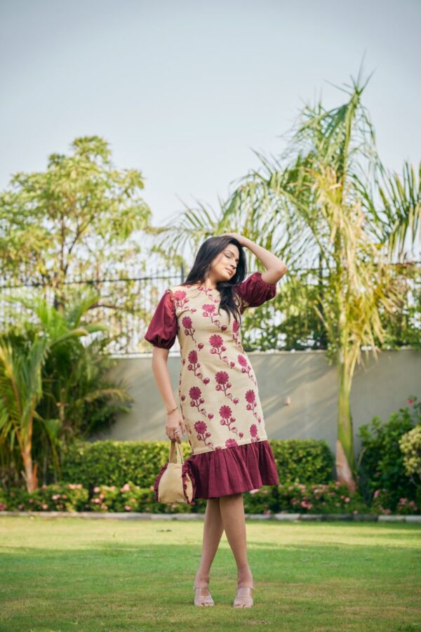 Block-printed detachable dress featuring a vibrant floral pattern and adjustable design.